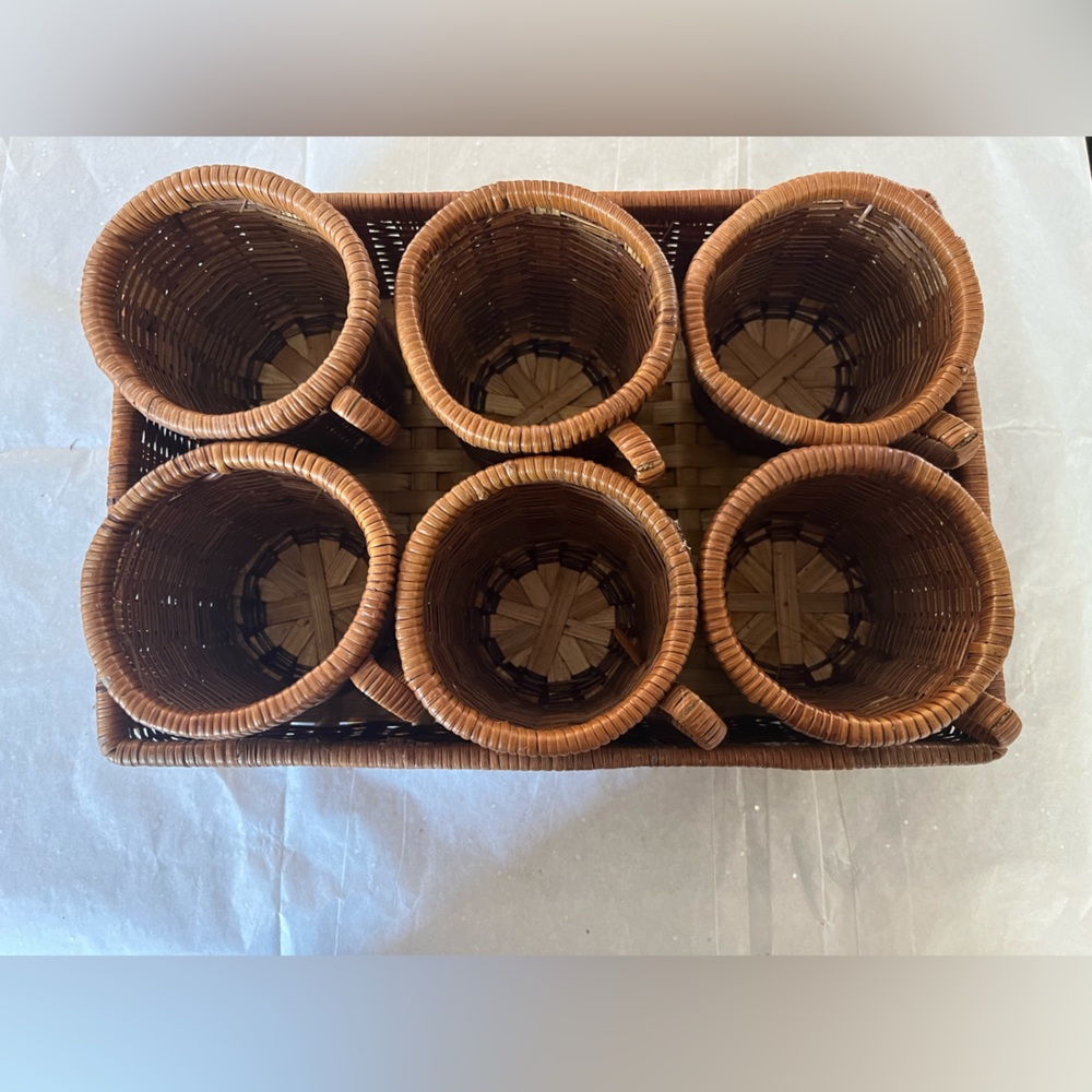 6 wicker cups in a basket